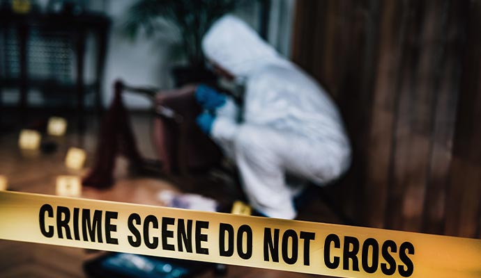 Professional worker cleaning biohazard waste