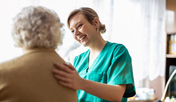 Caregiver with an elderly patient.