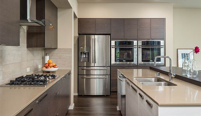 Clean restored refrigerator in kitchen