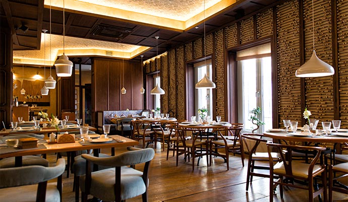A beautifully lit and fully restored luxury restaurant dining area