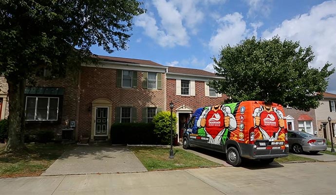 Crossroads property rescue with service van.