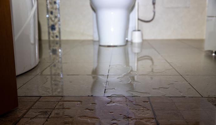Water damaged bathroom floor