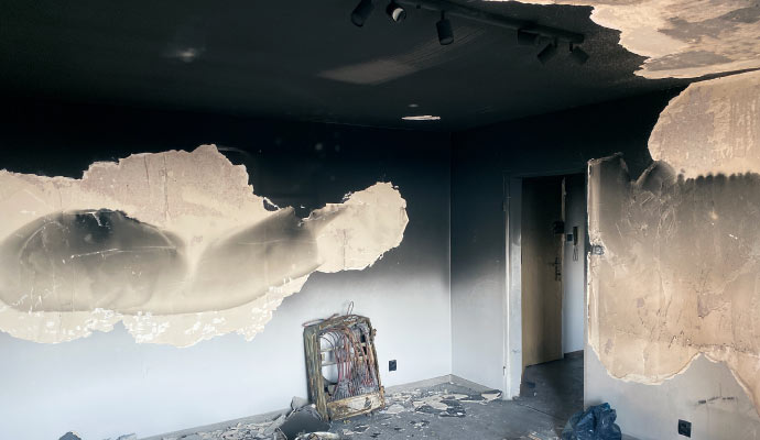 Fire and smoke damaged wall