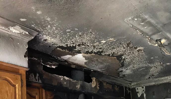 Fire damaged kitchen ceiling