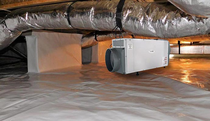 Installed dehumidification system in crawl space