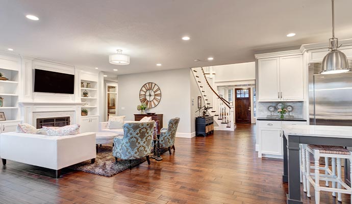 Modern open-concept home with living, kitchen, and dining areas.