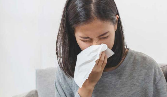 Person sneezing Person sneezing