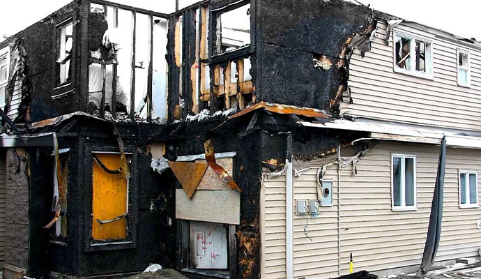 Severe fire damaged house