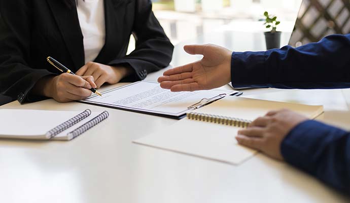 Paperwork signing and receiving assistance for final settlement of insurance claim process