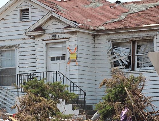 Disaster-damaged property after a storm Disaster-damaged property after a storm