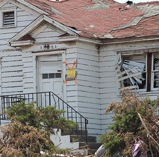 Residential roof leak after heavy damage