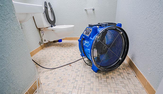 Air mover drying bathroom floor