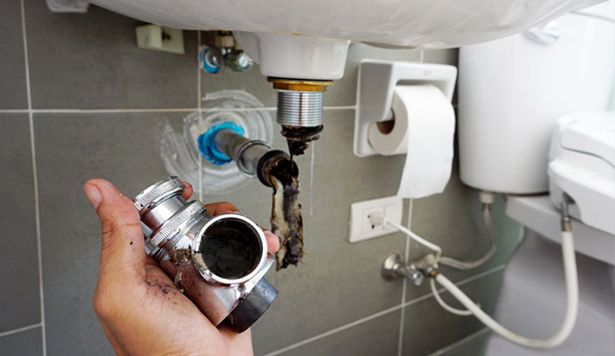 Clogged drain cleanup service