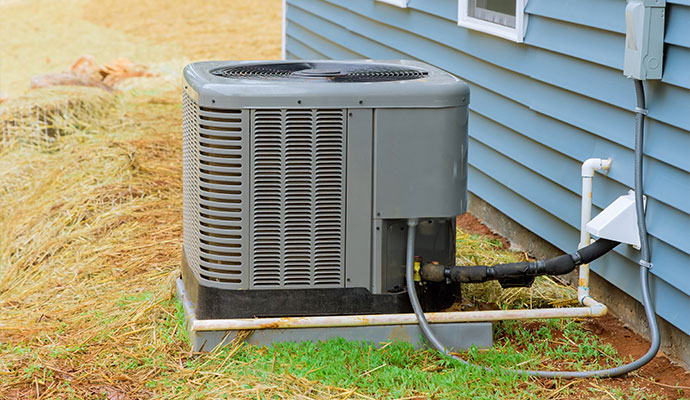 Outdoor HVAC unit discharge line