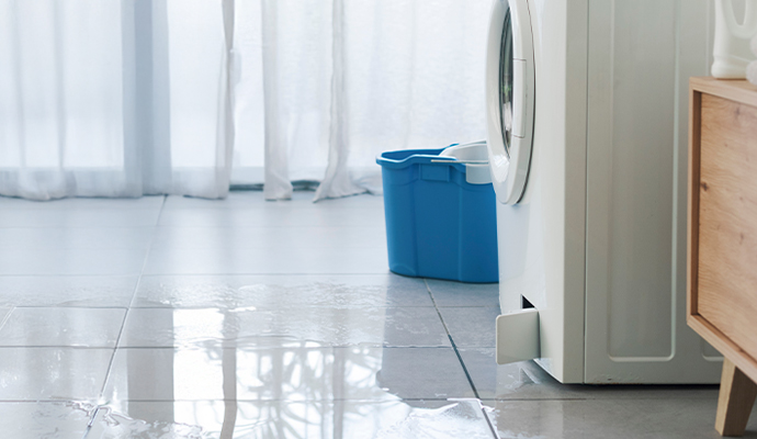 Washing machine leaking water on the floor